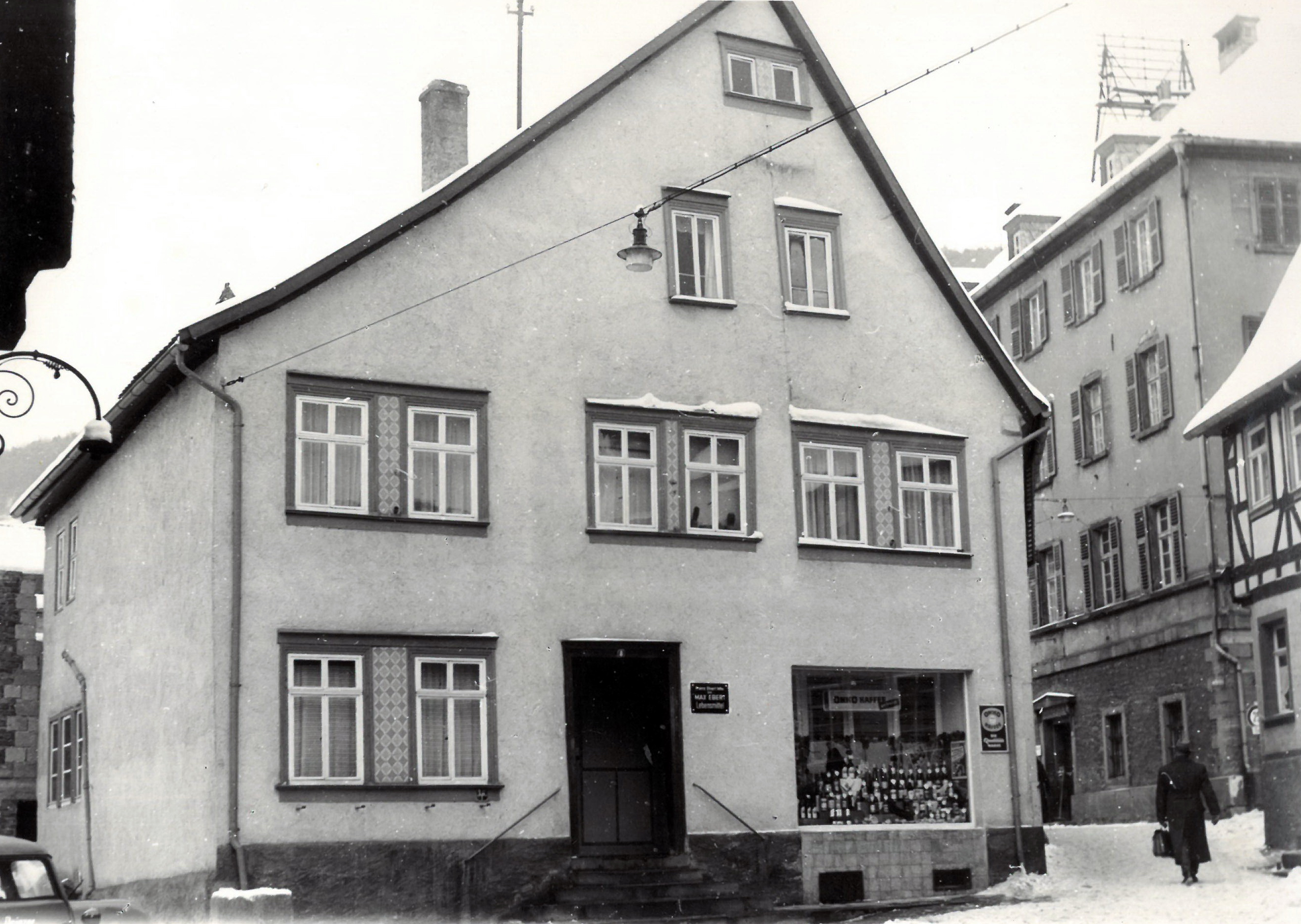 Lebensmittelmarkt Ebert um 1960 im Winter
